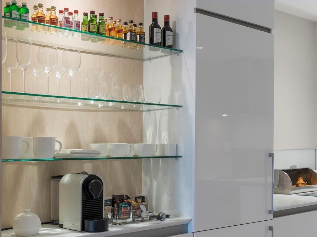 South Beach Camps Bay Boutique Hotel Cape Town Bagian luar foto A kitchen with a Nespresso machine
